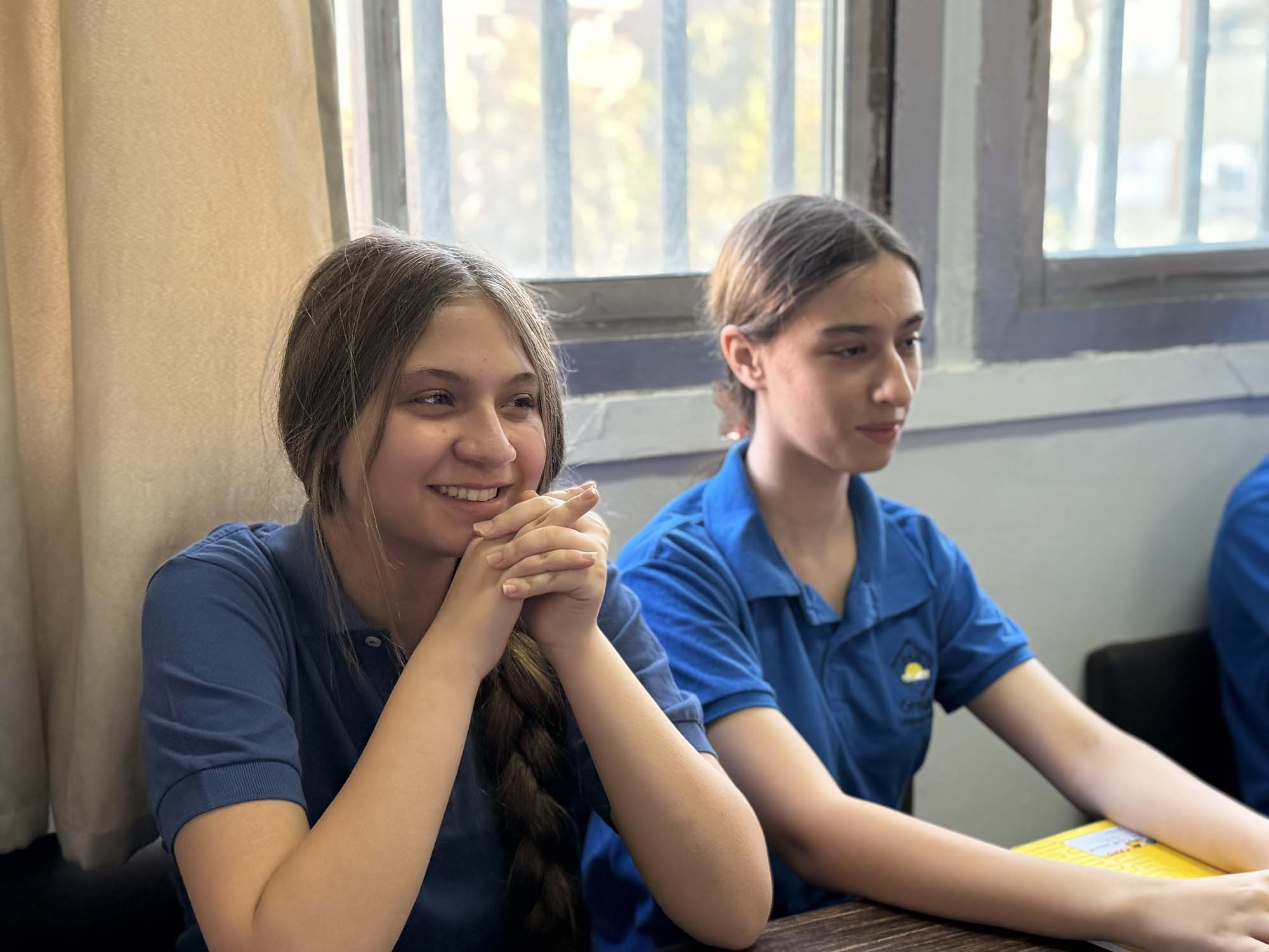 OLS students listening together during a classroom discussion