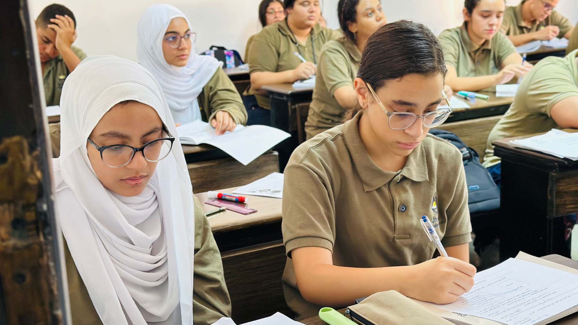 Secondary students working independently in class