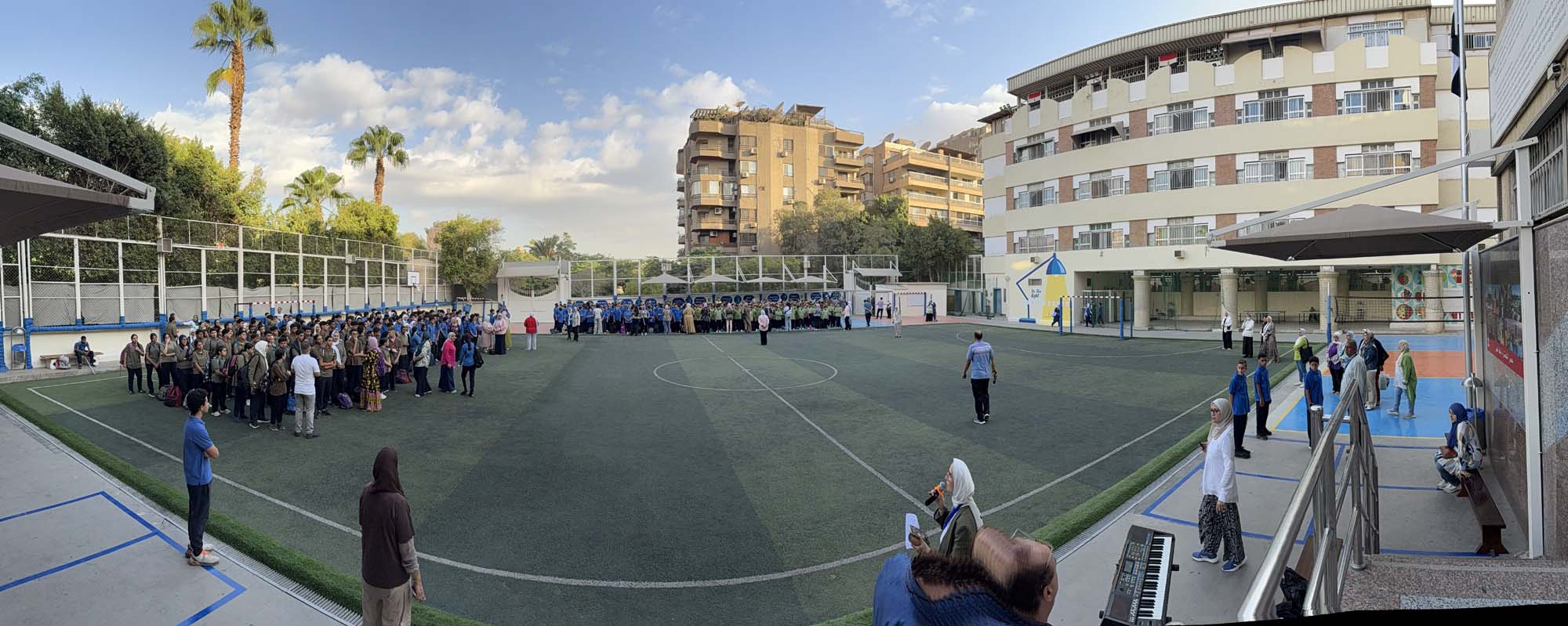 The OLS Maadi campus and school courtyard during a gathering