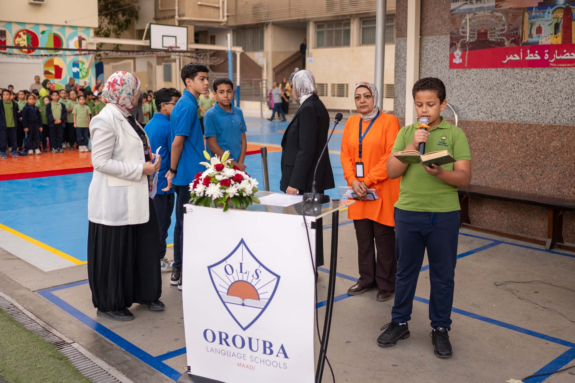 OLS students speaking at a school recognition gathering